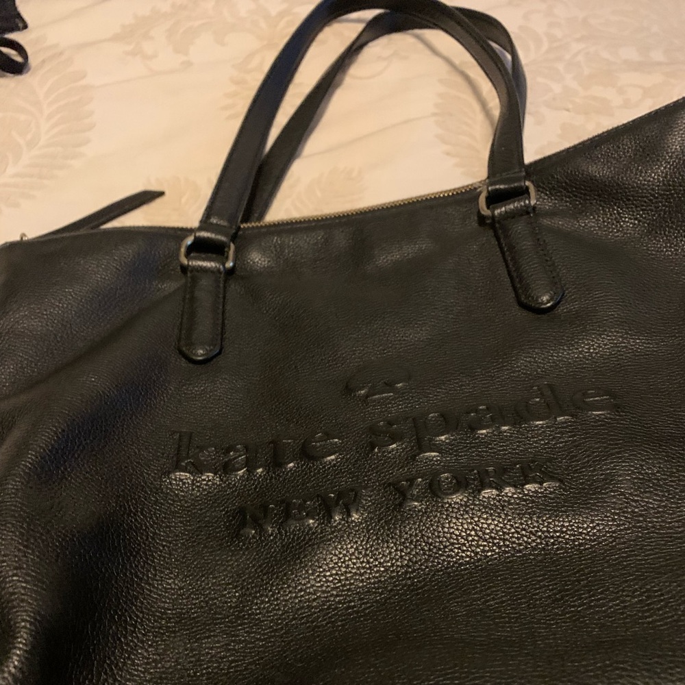 Black Kate Spade purse. Good condition. Well kept. No stains or holes inside.
